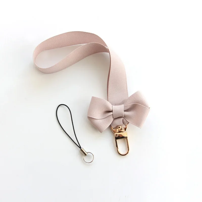 トレンディなちょう結び携帯電話チェーン女性のための素敵な携帯 - Fashion Women Picture のレビューと価格